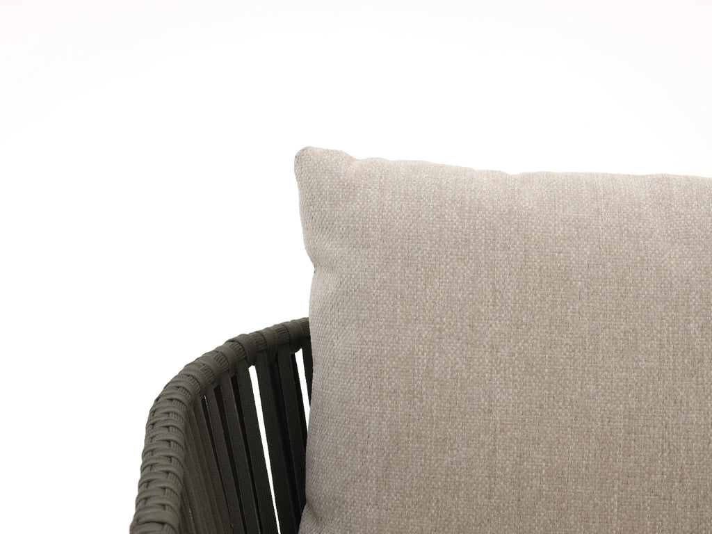 Close-up of beige weatherproof cushion fabric on outdoor sofa set
