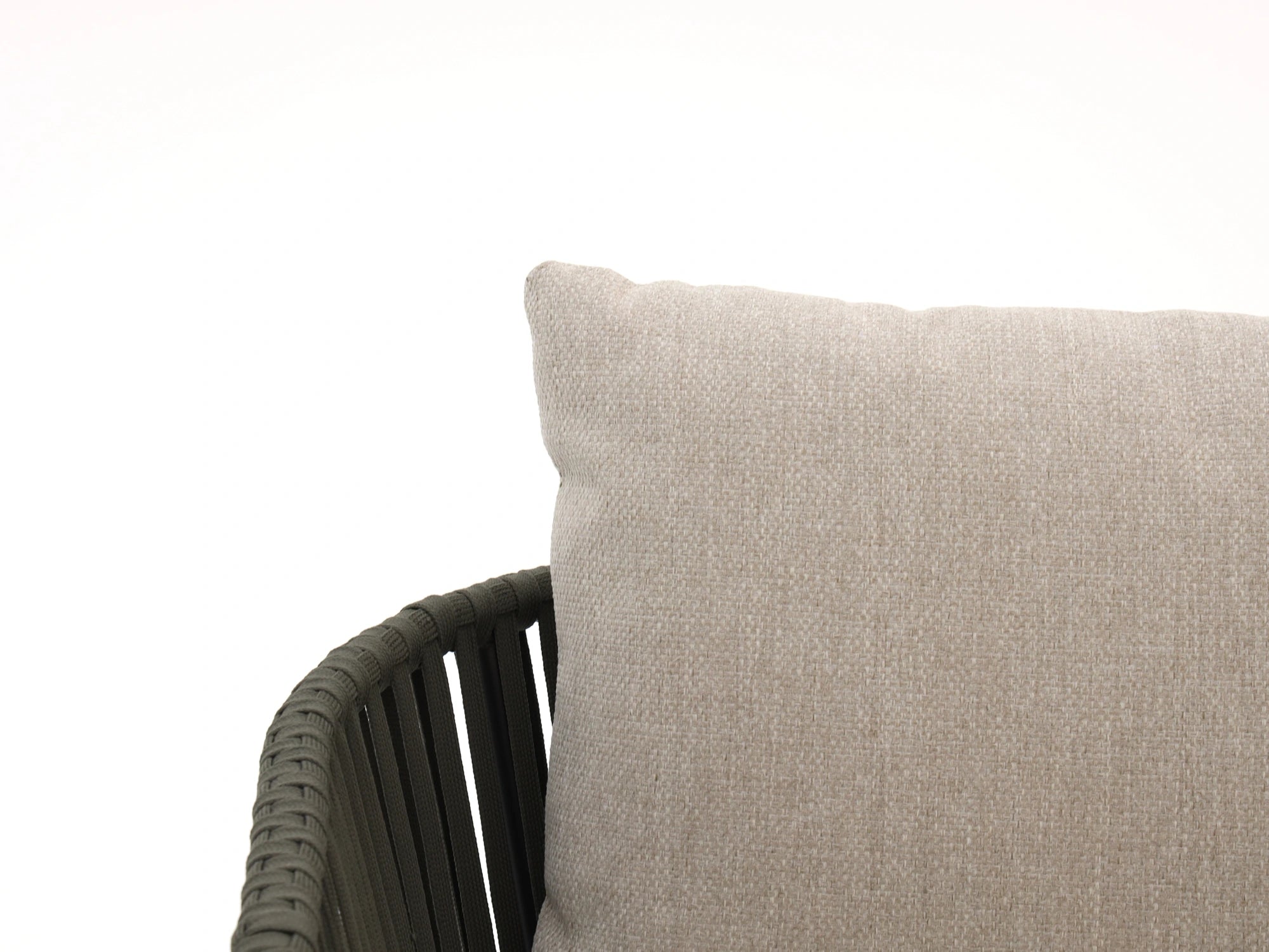 Close-up of beige weatherproof cushion fabric on outdoor sofa set