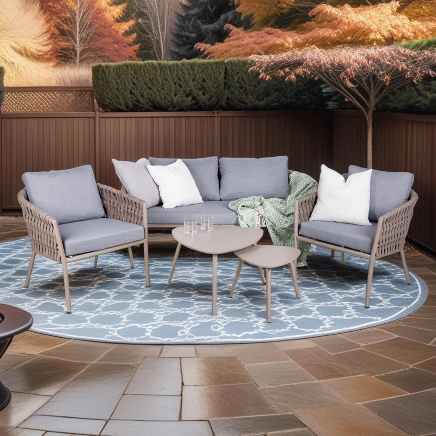 Complete Eden 4-piece rope outdoor sofa set with dual center tables and lounge chairs