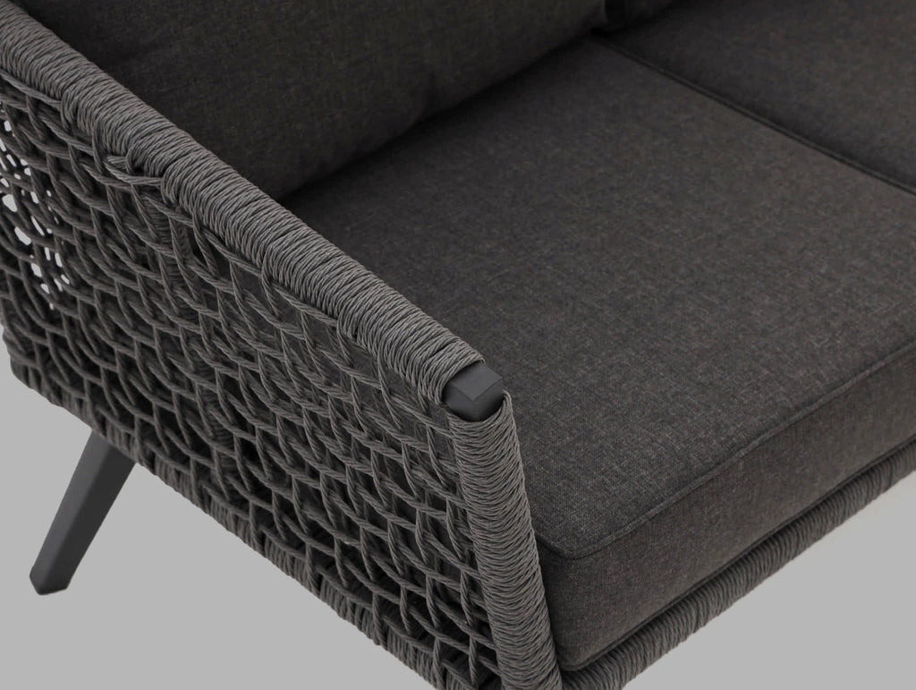 Close-up detail of handwoven HDPE rope armrest and cushion – Kensington by Outdoor Studio