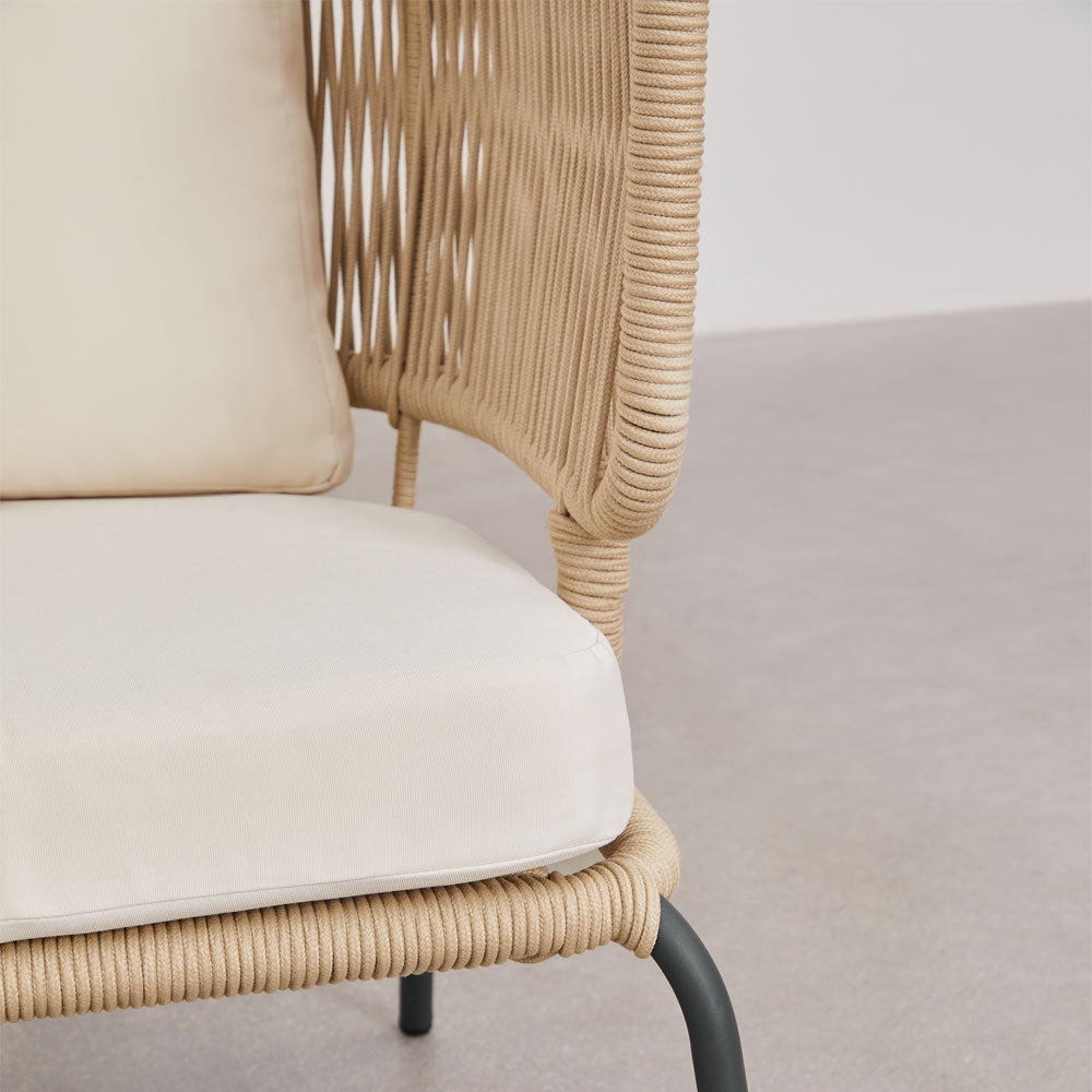 Side angle of Windsor outdoor sofa showcasing curved armrests and rope detailing